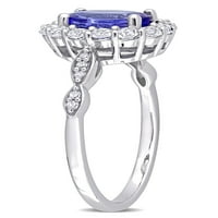 1- Carat T.G.W. Tanzanit, bijeli topaz i dijamantni naglasak 14KT bijelo zlato ovalni zaručnički prsten